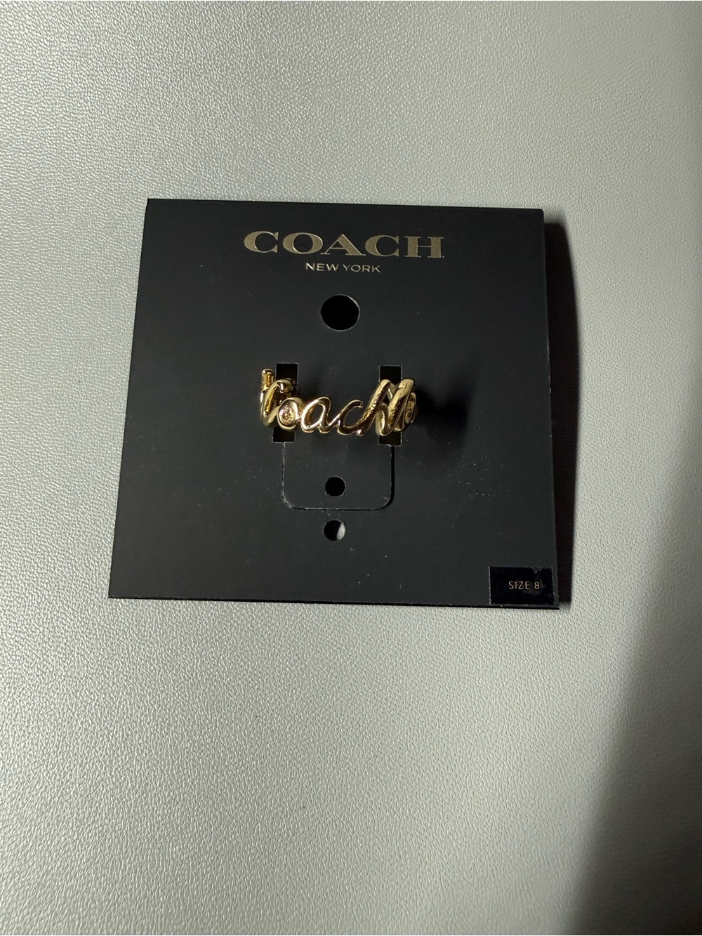 Coach Gold Script Logo Ring Crystal Accent Size 8 NWT- Price os Firm - Picture 2 of 4